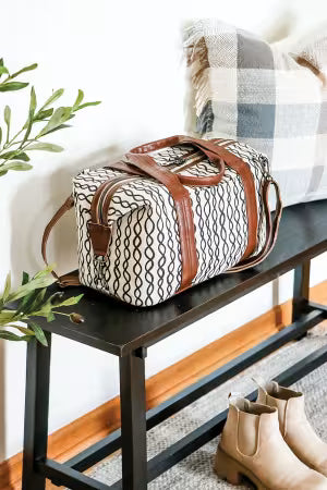 Essential bag making reference tool; patterned tote bag with brown leather handles