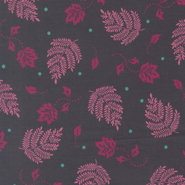 Paisley leaf fabric swatch with magenta and teal botanical pattern on dark gray