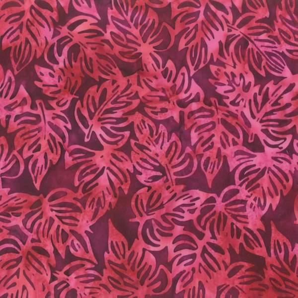 Batik fabric swatch with coral and violet leaf pattern