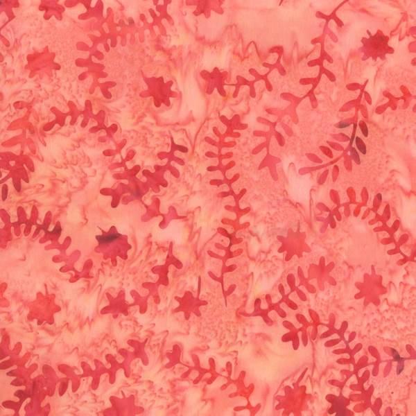Pink batik fabric with fern and leaf motif pattern