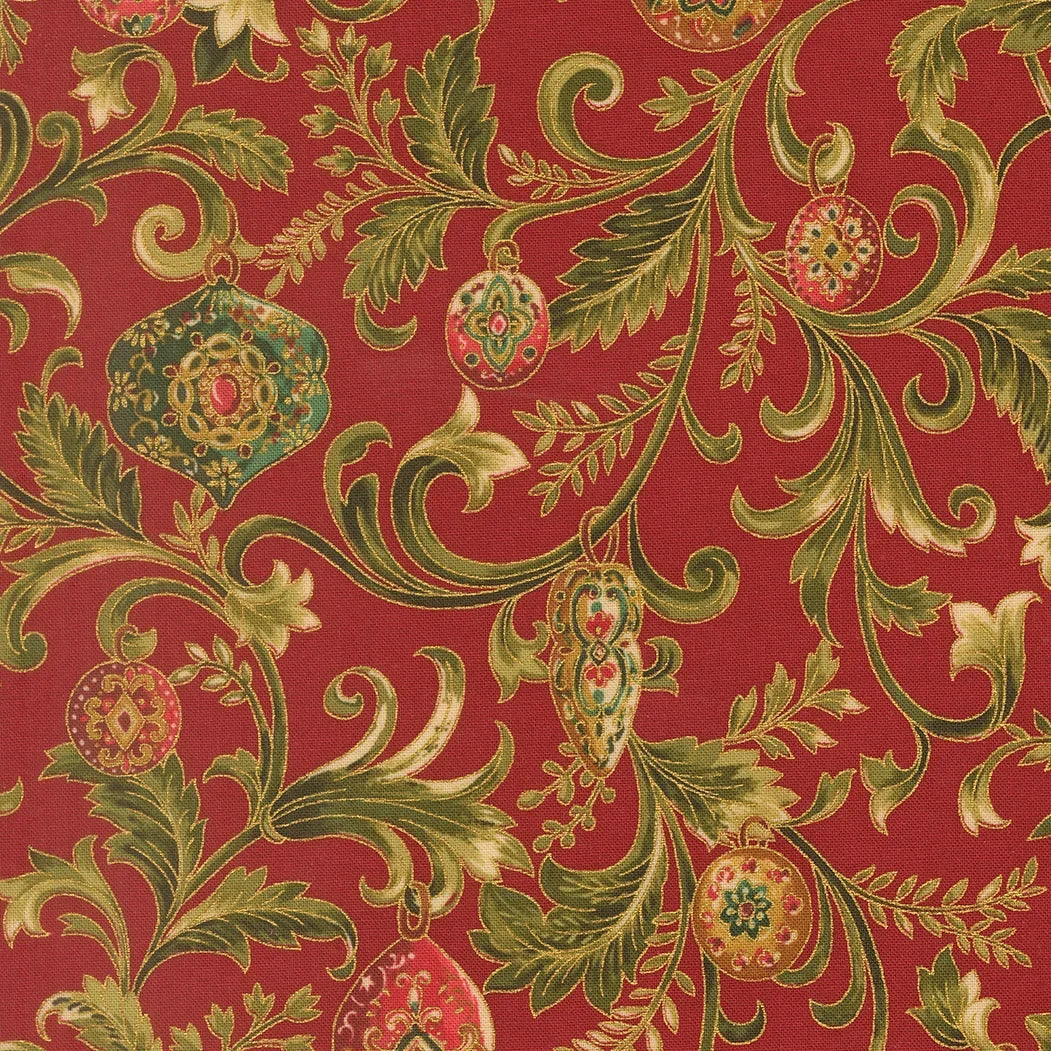 Crimson red printed fabric with ornate gold, green and teal floral paisley pattern