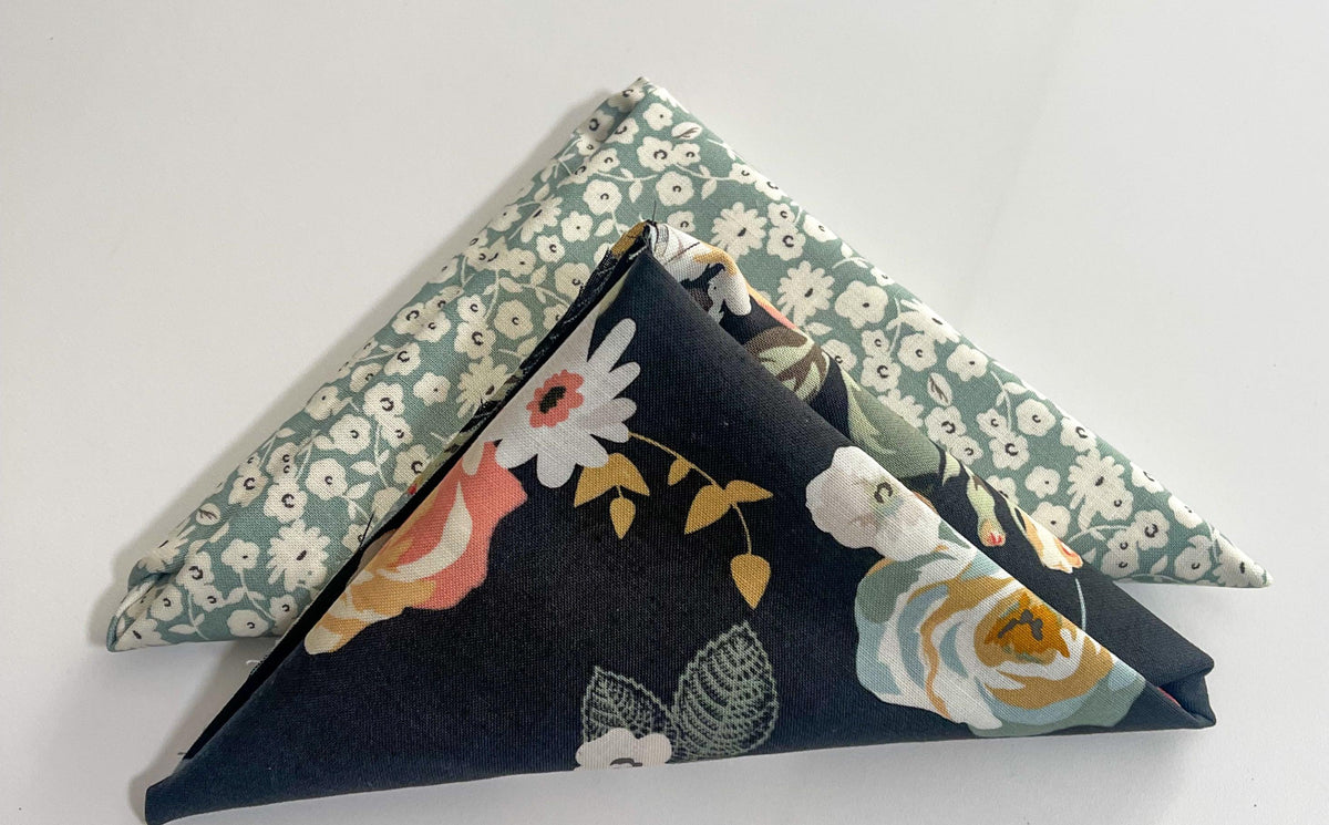 Table runner bundle with blue gingham and floral fabric pieces, folded for display.