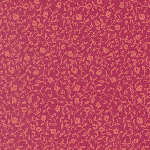 Pomegranate red floral vine cotton fabric with small leaf motifs