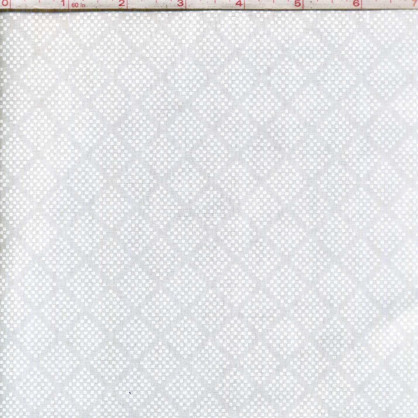 Argyle diamond pattern fabric swatch with small repeating pale texture