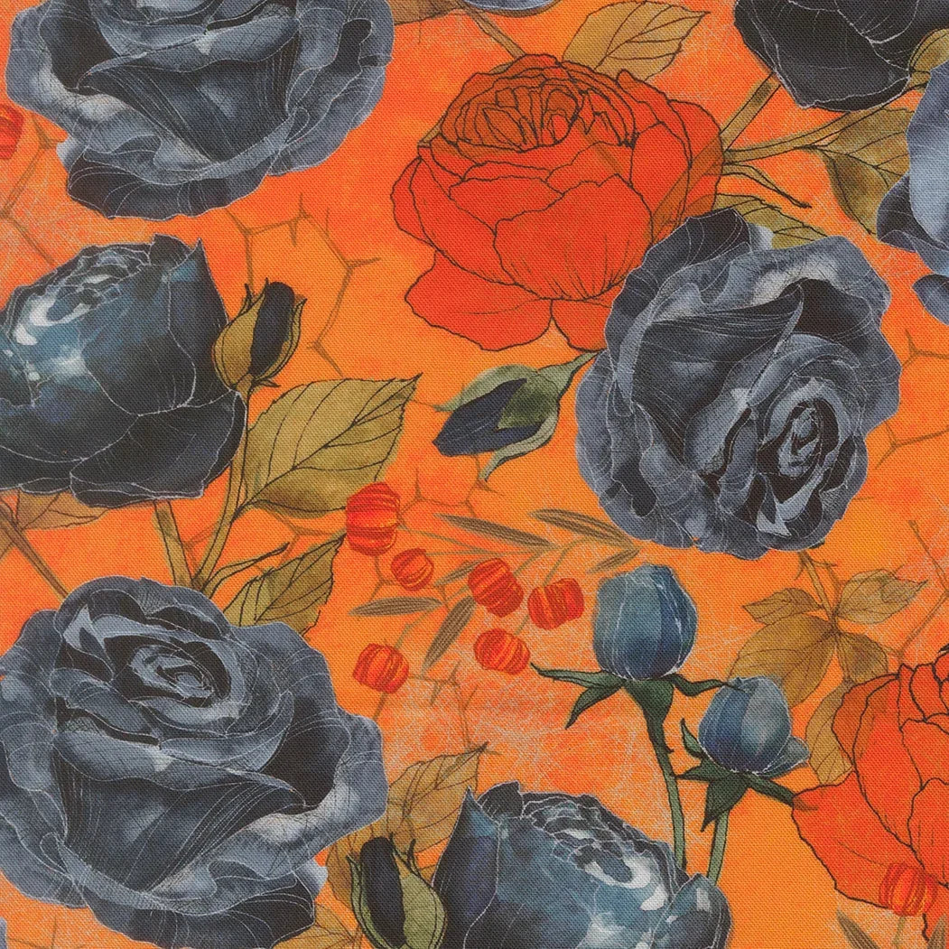 Orange quilting fabric with dark gray roses, small pumpkins, and green leaves