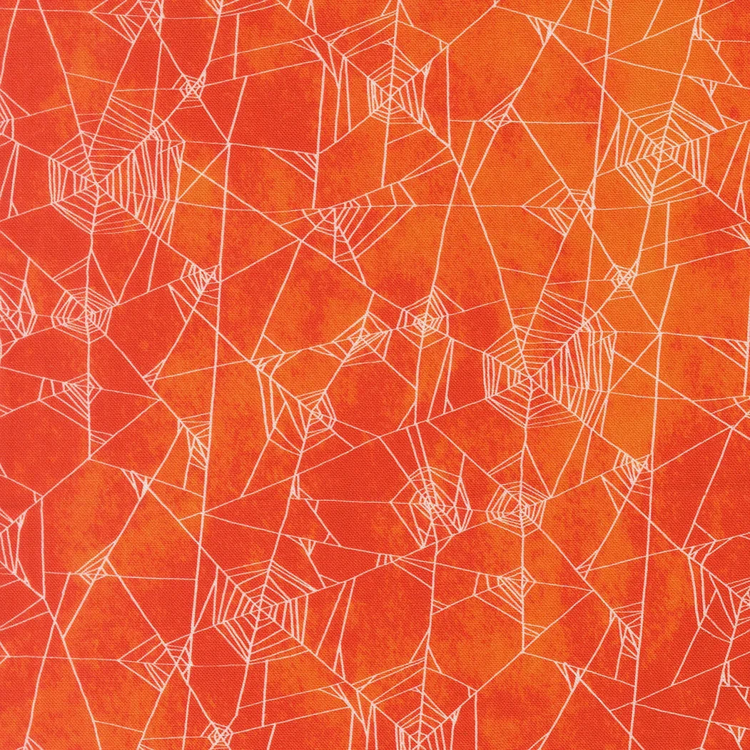 Orange spider web pattern fabric with white geometric web lines