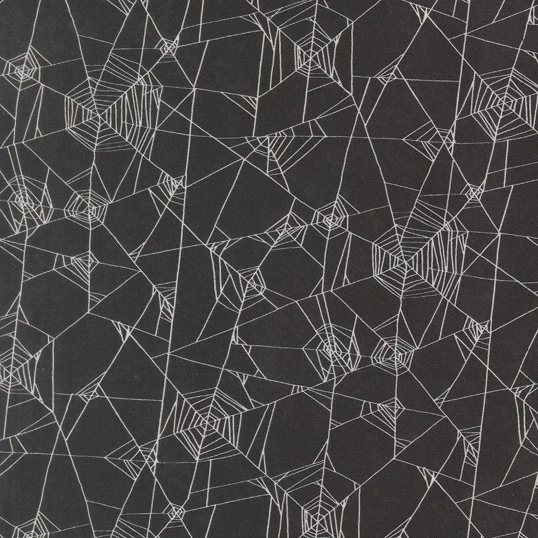 Spider web geometric fabric in dark onyx with white line pattern