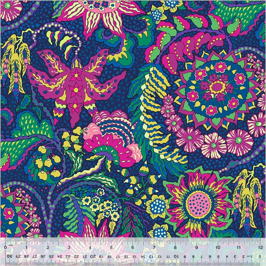 Indigo fabric with colorful floral and abstract bird-like motifs, dense pattern