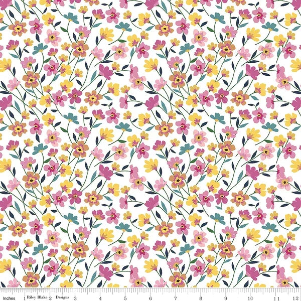 White cotton fabric with scattered small flowers and colorful stems, repeating pattern