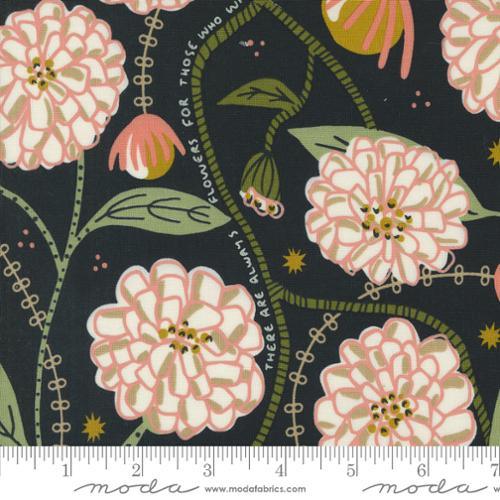 Floral cotton fabric with large pink blossoms and green leaves on dark background