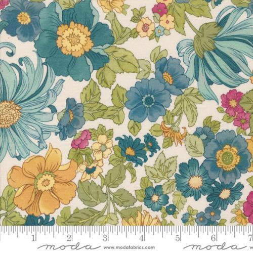 Floral quilting fabric with blue, teal, and yellow flowers on a light background