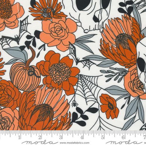 White fabric with orange floral and pumpkin motifs, vines, leaves, and spiderwebs