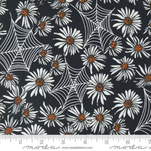 Dark quilting cotton fabric with white daisies, orange centers, and spiderweb lines