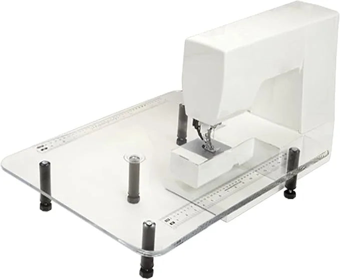 Portable large sewing table with white base, adjustable corner feet, and measuring guide