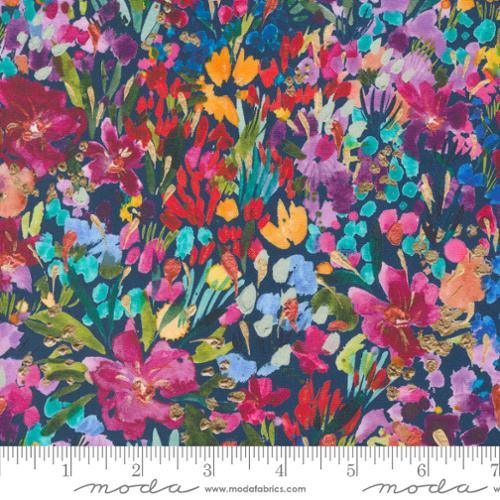 Floral cotton quilting fabric with multicolor blooms on dark blue background