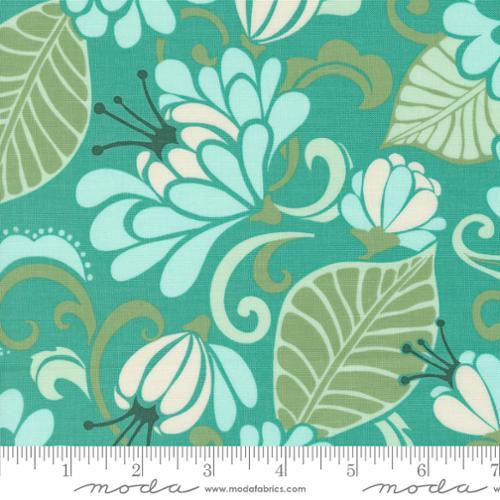 Teal floral fabric with large white blossoms and leafy accents, repeating pattern