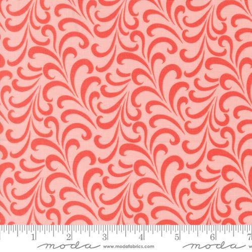 Coral red fabric with teal swirling petal pattern, Moda Fabrics