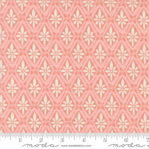 Peach pink fabric with white and tan petal starburst pattern, Moda Fabrics