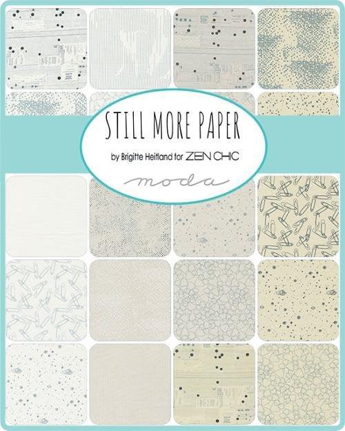 Paper mini charm pack with assorted patterned 2.5-inch fabric squares in light tones