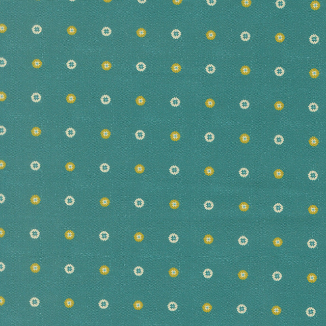 Teal floral fabric with small dotted blossom pattern