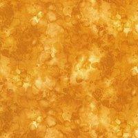 Butterscotch solid batik-style fabric with small swirled motifs, close-up