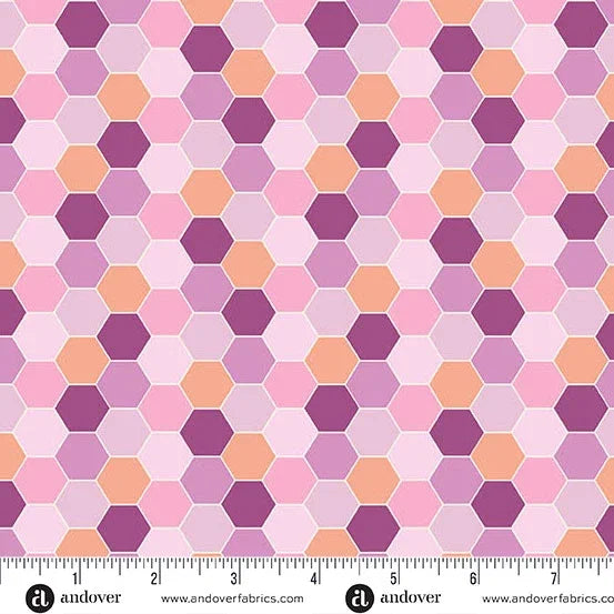 Purple, pink, and peach hexagon print fabric with repeating geometric pattern