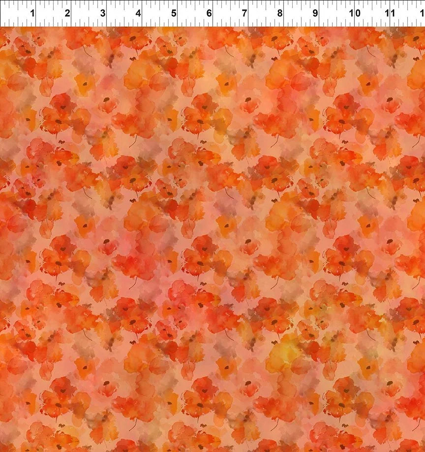 Orange and yellow watercolor floral fabric with scattered poppy blossoms