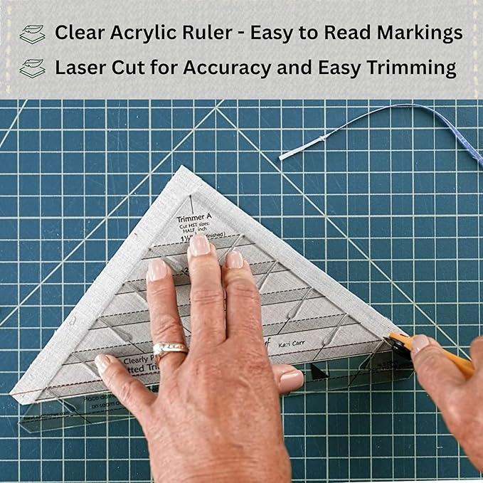 Clear acrylic slotted trimmer ruler with laser-cut guide lines for easy quilting trimming