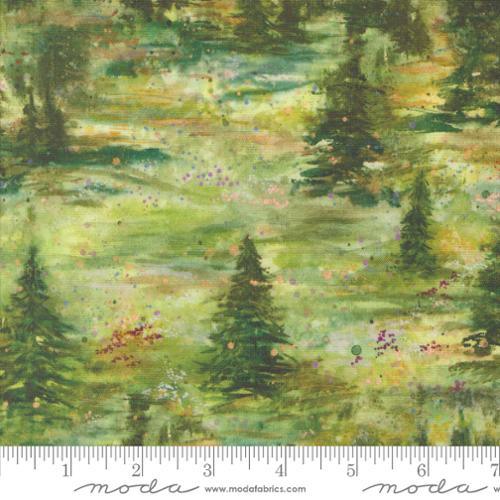 Green forest watercolor fabric with layered trees and speckled accents