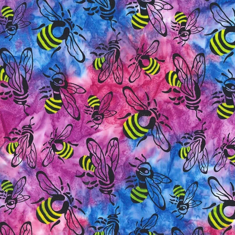 Banyan Batik fabric with magenta, blue, and yellow bee and floral pattern