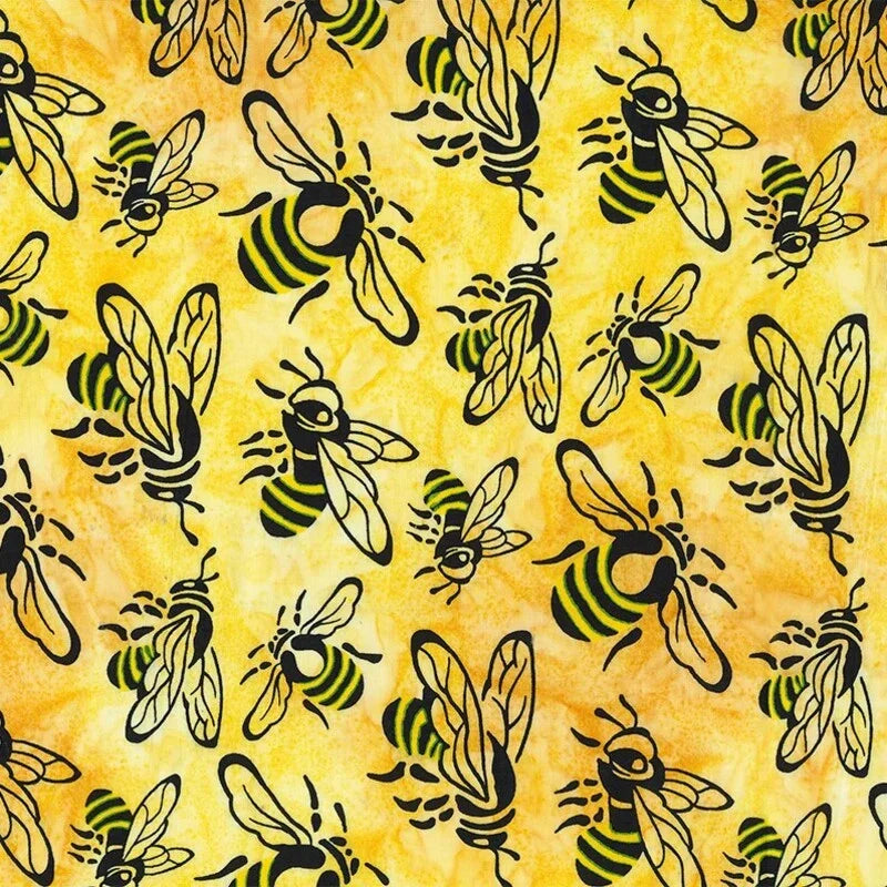 Marigold banyan batik fabric with black and gold bee print