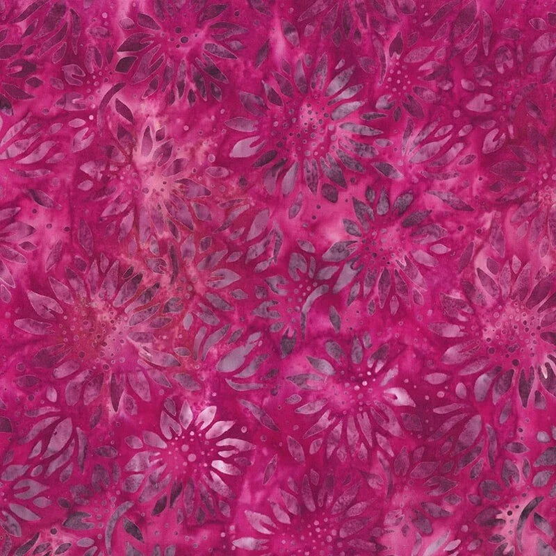 Magenta floral batik fabric with dark pink flowerburst pattern