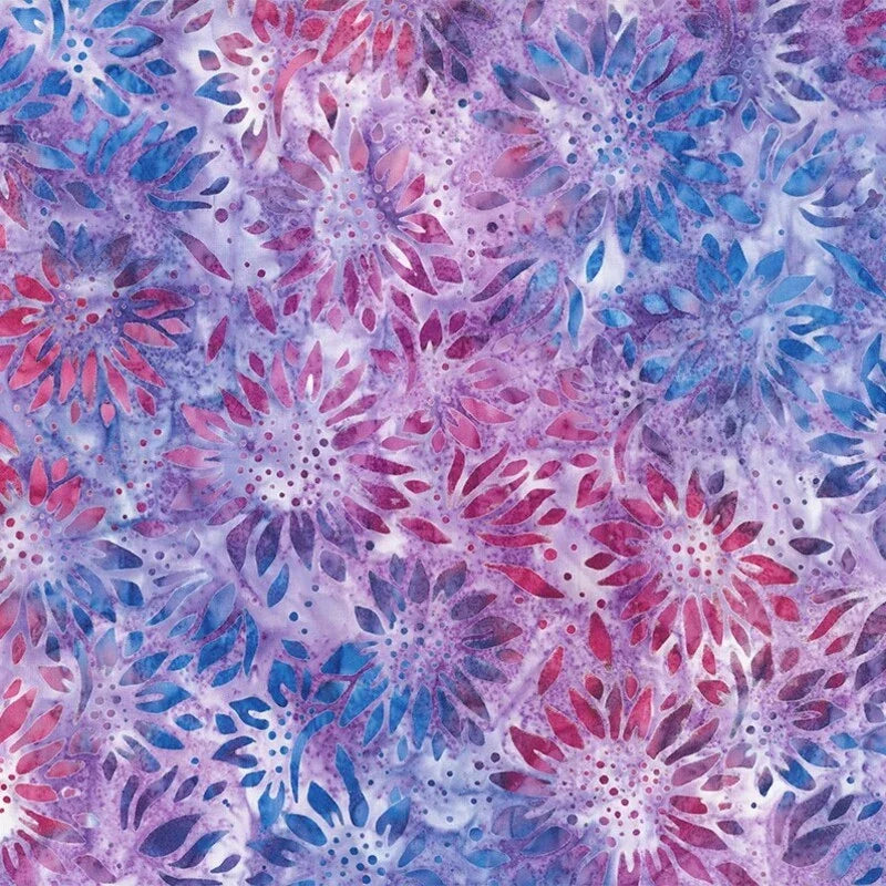 Lilac batik-style floral print fabric with blue and pink flowerburst motifs