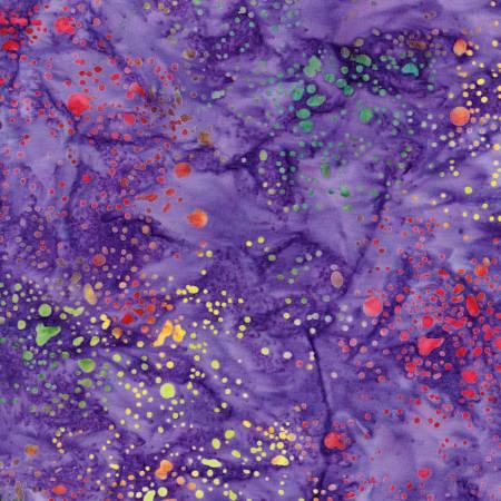 Purple batik fabric with multicolor paint splatter dots and streaks