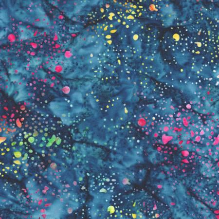 Batik fabric with blue base and colorful paint splatter dots and streaks