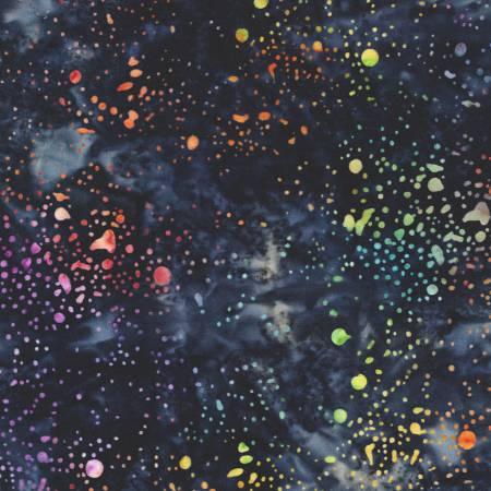 Batik fabric with dark blue cloud pattern and colorful paint splatter dots