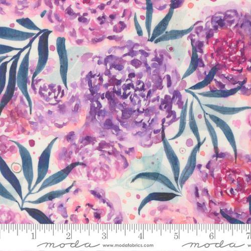 Purple lavender floral fabric close-up with hydrangea-like blooms and blue leaves