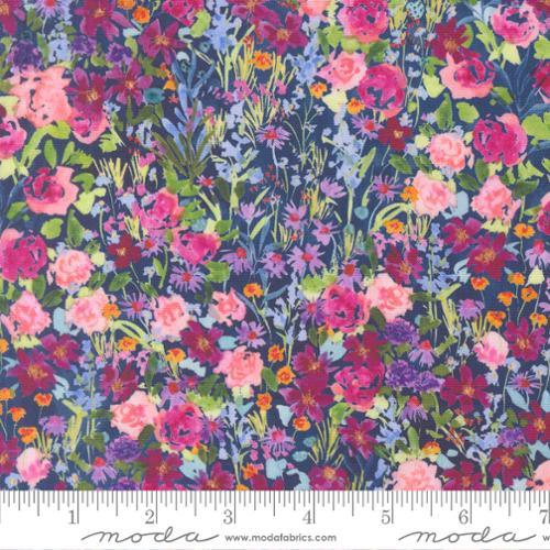 Floral fabric swatch with dense wildflowers in pink, green, and yellow on dark blue
