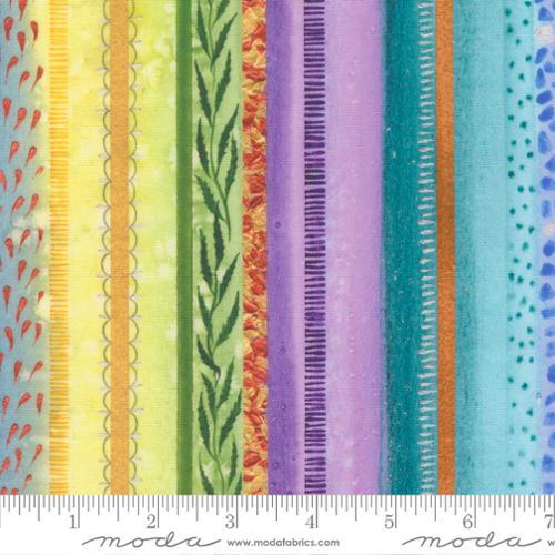 Rainbow stripe fabric panels in yellow, green, purple, teal, and blue with motifs