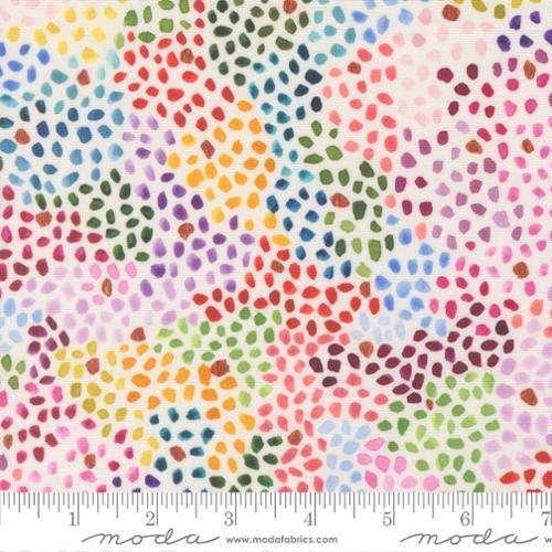 Multicolor confetti dot fabric on pale pink with dense scattered small circles