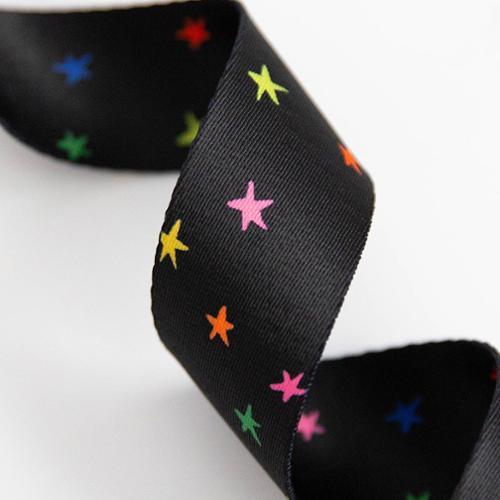 Black webbing ribbon with multicolor star pattern
