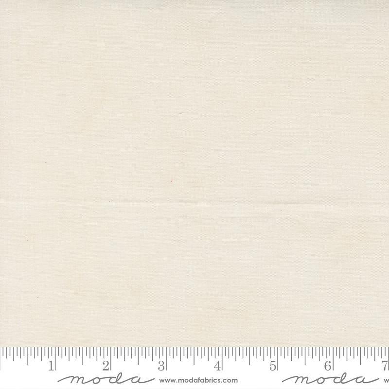 Cream quilting cotton fabric with subtle speckled texture