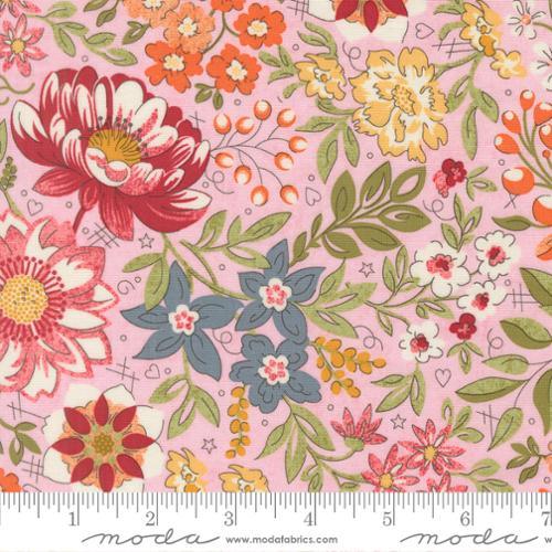 Pink floral quilting cotton with multicolor blooms, leaves and hearts