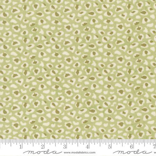 Light green fabric with small off-white wildflower and leaf pattern