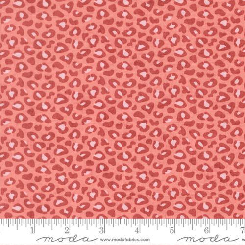 Pink floral fabric with small peony blossoms and looping vine pattern