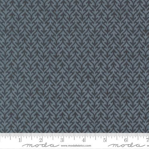 Blue-gray fabric with dark trellis and leaf pattern