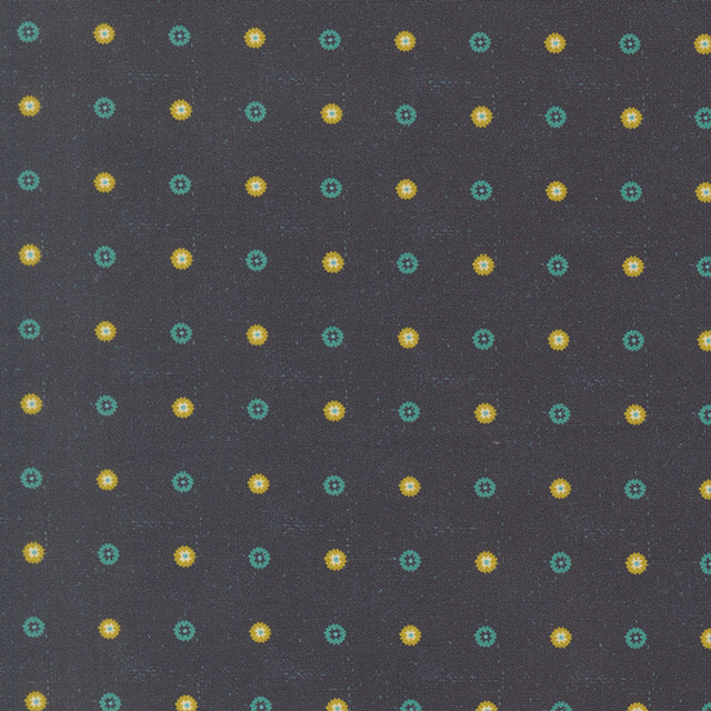Midnight fabric with scattered teal and yellow small starburst floral motifs
