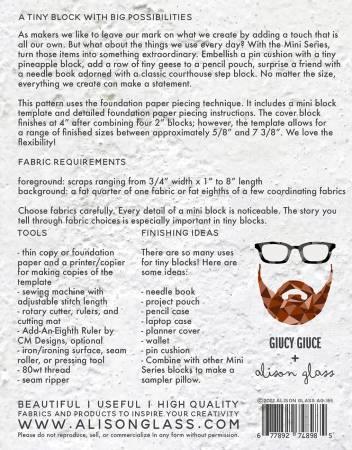 Quilting pattern booklet back with printed text and Guicy Guice glasses logo