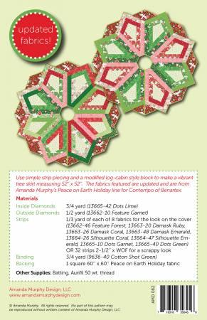 Patchwork Christmas tree skirt with circular design, red, green, and white star blocks
