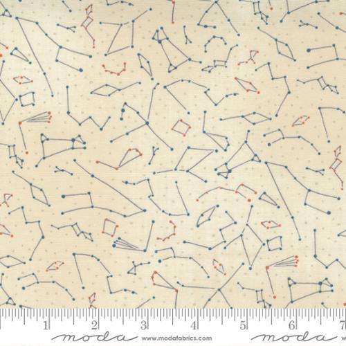 Light cream constellation print cotton fabric with blue, red, and gray star-line patterns